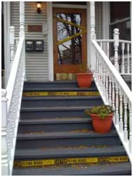 staircase with caution tape:  caution  flying beads 