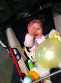 baby with balloon