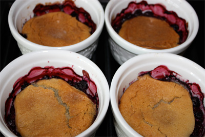 baked cookies over berries