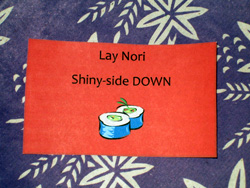 Sign:  lay nori shiny side down